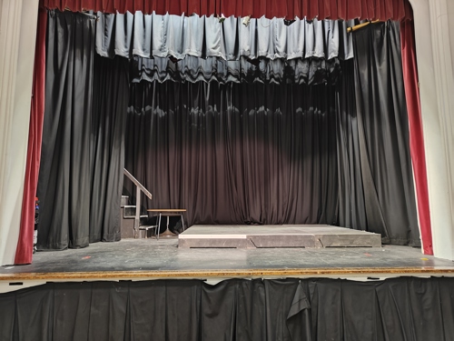 Raised Stage with black drapes